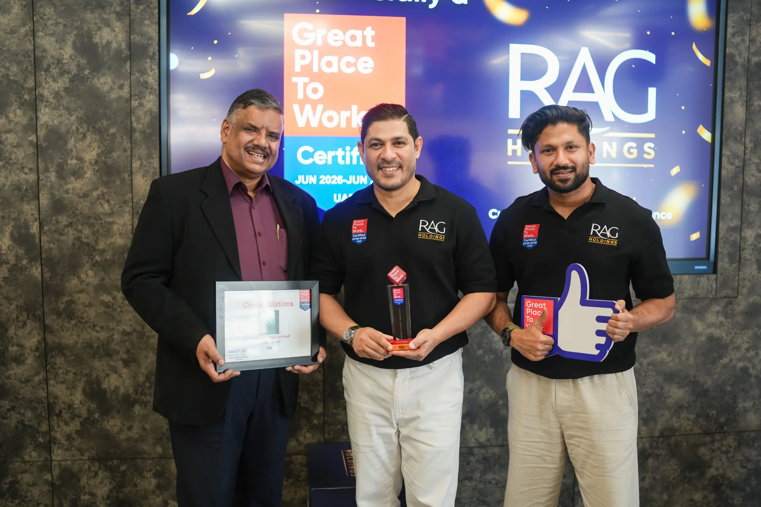 Employees celebrating RAG Holdings' Great Place to Work® Certification in the UAE.